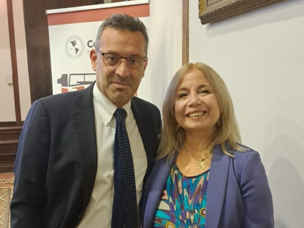 Ximena Silva junto a Carlos Mora, Defensor Nacional.